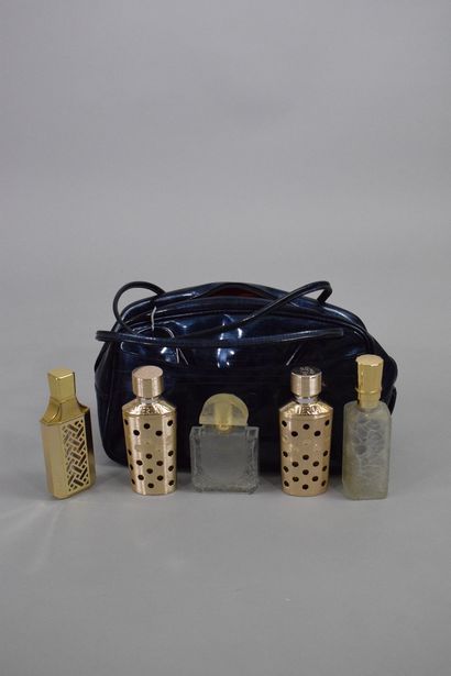 null GUERLAIN- LALIQUE - ANONYMOUS

Lot composed of five bottles of perfumes and...