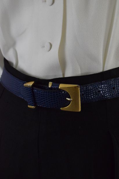 null MARIE GALANTE 

Blue exotic effect leather belt with stylized rectangular gold...