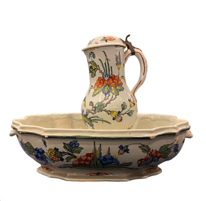 null A toilet in earthenware of Rouen, 
The jug on pedestal in enamelled iron 
The...