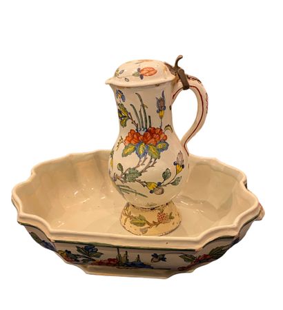 null A toilet in earthenware of Rouen, 
The jug on pedestal in enamelled iron 
The...