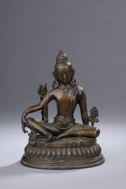 NEPAL - Début XXe siècle NEPAL - Début XXe siècle
Statuette de Shiva en bronze à...