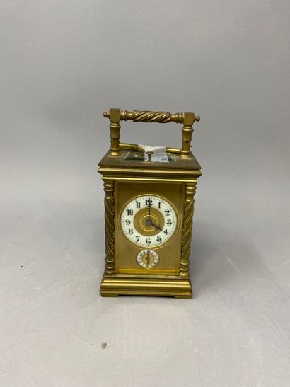 Pendule d'officier en bronze à 4 glaces à sonnerie heures-demies Officer's clock...