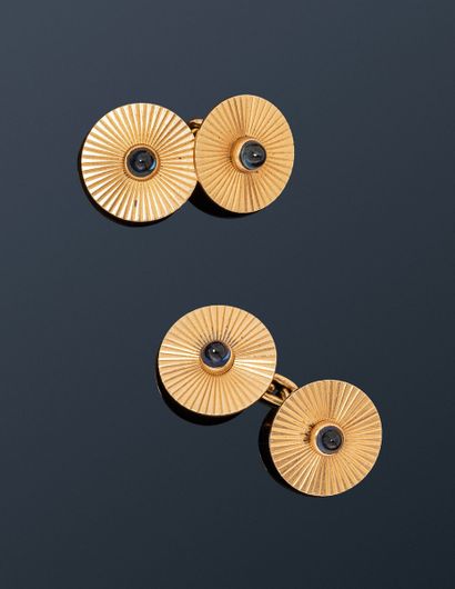 null MELLERIO
Pair of 18K (750) gold pastille cufflinks, each set with a cabochon...