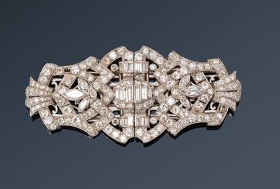 null Case of Madame X, Greece.
Double-clip brooch in platinum and 18K (750) gold,...