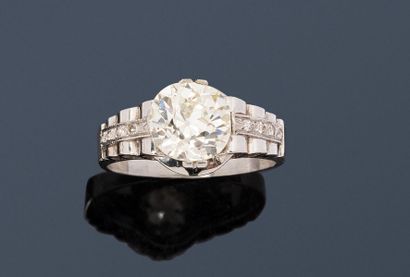 Platinum ring, set with an old-cut diamond...