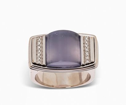 null POIRAY
Large 18K (750) white gold ring, set with a blue chalcedony surrounded...