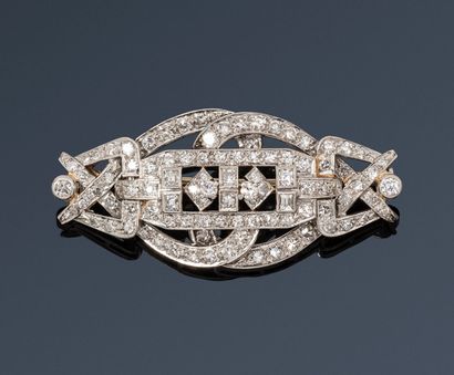 null Case of Mrs. Z, Greece.
Brooch in platinum pierced with geometrical motifs set...