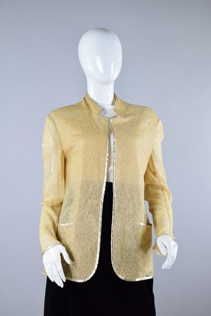 null TED LAPIDUS Mini Ted
Circa 1980

Rare jacket made of golden fluid lurex mesh,...