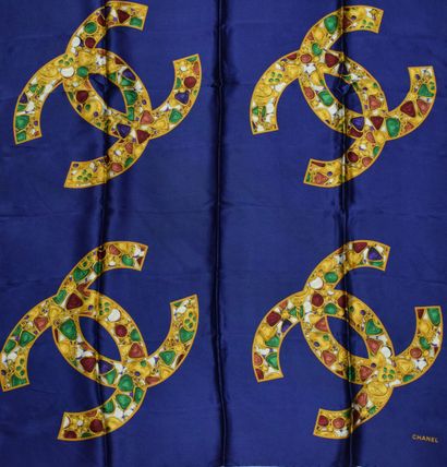 null CHANEL 

Blue silk square decorated with double CC logos of the House punctuated...