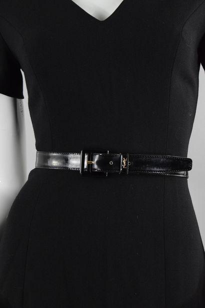 null YVES SAINT LAURENT 

Black patent leather belt, signed in gold. 

Length last...