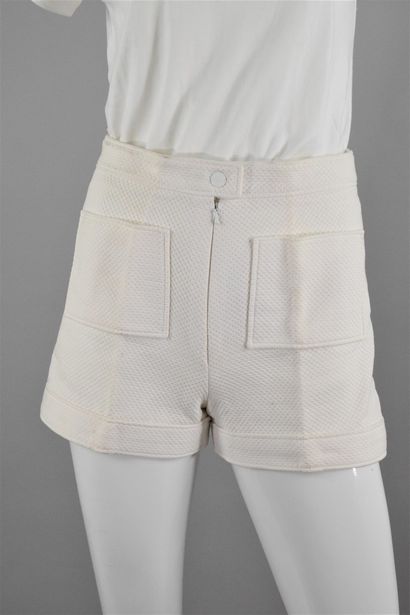 null COURREGES 
Circa 1970

Rare white micro shorts in embossed fabric. 
Numbered,...