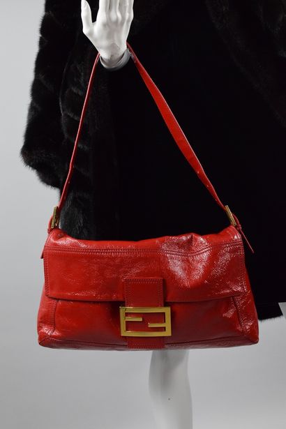 null FENDI 
Circa 2008

Rare bag maxi model "Baguette" in red patent leather with...