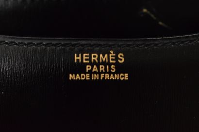 null HERMES PARIS 
Circa 1970

Sac modèle "Mini Constance" en cuir box noir et bijouterie...