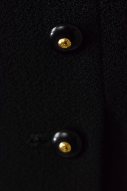 null CHANEL Boutique
Fall/Winter 1995

Black bouclette skirt, three buttons at the...