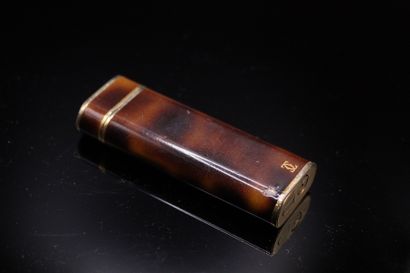 null CARTIER 

Gold plated lighter with brown moiré lacquer, signed on the bottom....