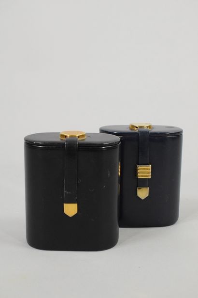 null GUERLAIN
Circa 1970

Set of two rare bottle cases, one in night blue leather...