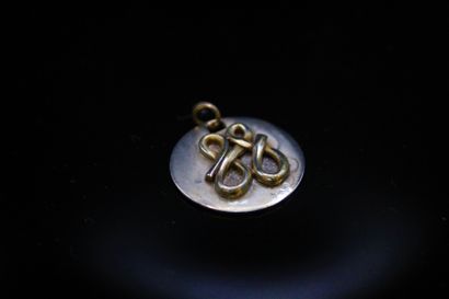 null ZOLOTAS

Silver pendant (950), year 1994.
Signed. 

On a black ribbon not signed....