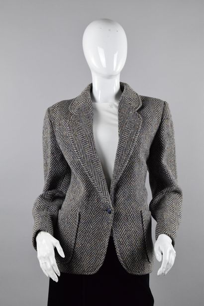 null TED LAPIDUS 
Circa 1970

One-button wool jacket with herringbone pattern punctuated...