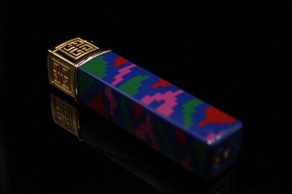 null GIVENCHY 
Circa 1980

Multicolored lighter in gilded metal and plastic. 
With...