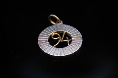 null ZOLOTAS

Pendant in 18k (750) yellow gold and 950 silver, year 1994.
Signed....