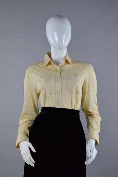 null CELINE 
Circa 1980

Short blouse in fine wool and two breast pockets, in pale...