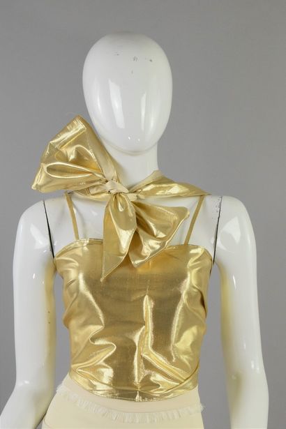 null MINI TED (TED LAPIDUS)
Circa 1980

Rare gold lurex top adjustable by a winding...