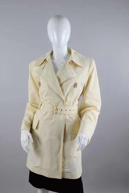 null HERMES PARIS 
Circa end of 1980

Off-white overcoat with zippered pockets and...