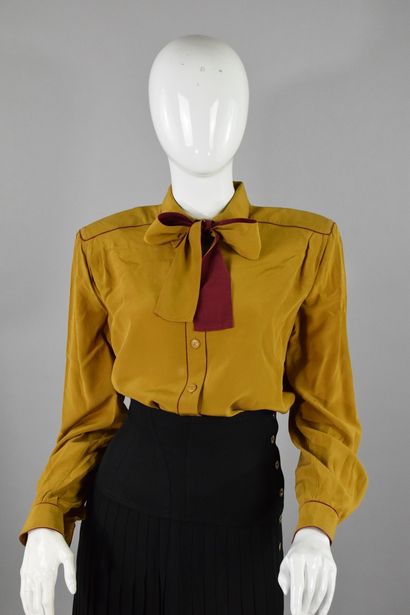 null JEAN LOUIS SCHERRER 

Mustard silk blouse with integrated collar like a tie...