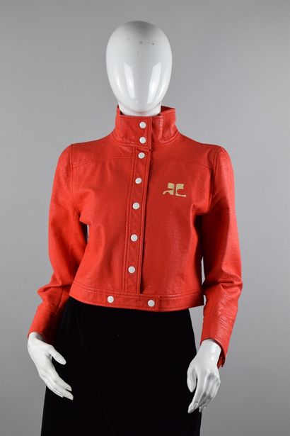 null COURREGES 
Circa late 1970

Rare iconic jacket of the House in aged bright orange...
