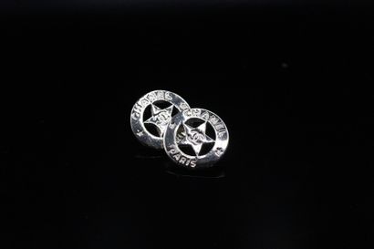 null CHANEL 

Pair of silver-plated metal ear studs with a star motif. 
Signed on...