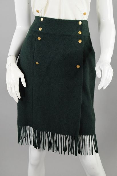 null CHANEL 
Circa 1990

Fir green wool blend wrap skirt with bangs on the bottom,...