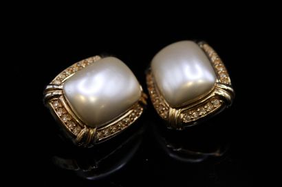 null LERITZ 

Pair of gold-plated metal ear clips decorated with fancy pearls and...