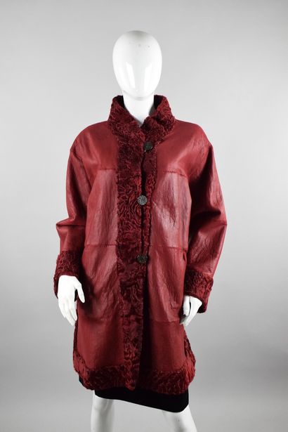 null YVES SAINT LAURENT Furs
Circa late 1970

Rare coat in burgundy astrakhan, reversible...