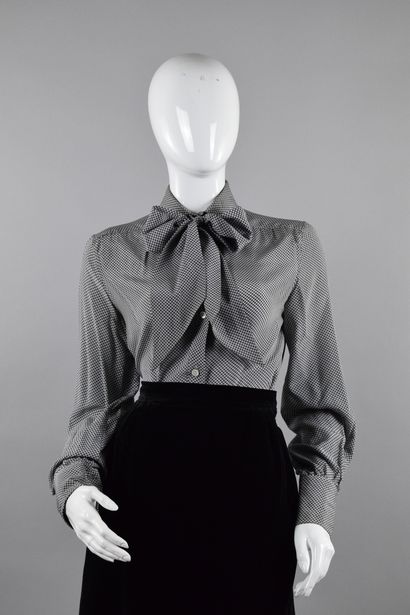 null TED LAPIDUS Boutique
Circa 1980

Silk blouse with black and white geometric...