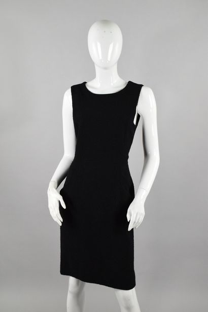 null CHANEL Boutique 
Circa 1990

Black wool bouclette dress, two diagonal pockets...