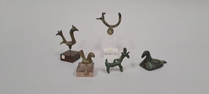 null Lot including figurines of stylized rooster
A pendant ending in a hand and a...