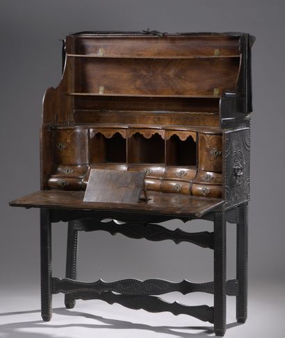 null Curious travel desk in the form of a trunk lined with leather with studded decoration...