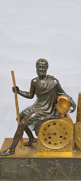 null A gilt bronze clock with a medal patina representing Belisarius as a blind beggar....