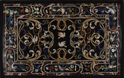 null Rectangular tray in black marble and inlaid with polychrome hard stones decorated...