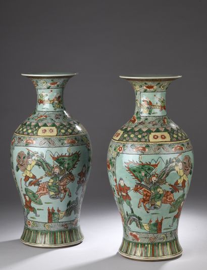 null CHINA - 20th century
A pair of flared-necked baluster vases in polychrome enameled...