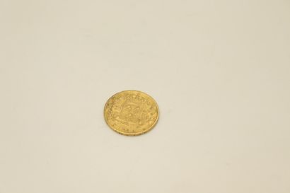 null Gold coin of 20 Francs Louis XVIII (1818, A).

Weight : 6.3 g.