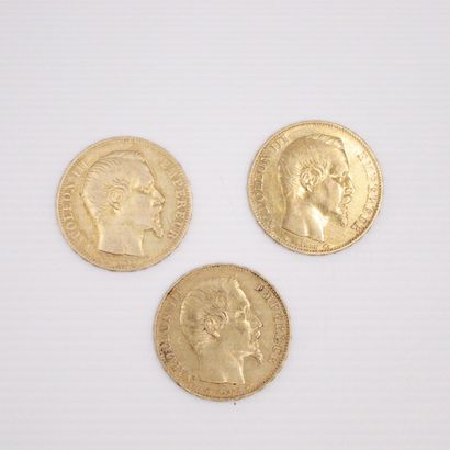 null Lot de trois pièces en or de 20 francs Napoléon III tête nue. (1854 A x3)
TTB...