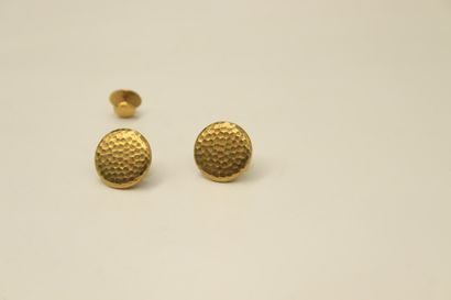 null Two breastplate buttons and a small button in 18k (750) hammered yellow gold,...