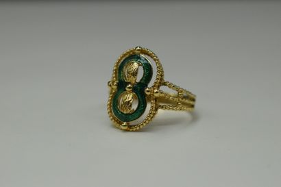 null 18k (750) yellow gold openwork ring, decorated with green enamel.
Finger size...