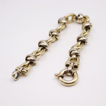 null Yellow and white gold bracelet 18k (750). 
French work. 
Wrist size : 19 cm....