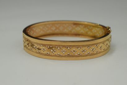null Lot de deux bracelets articulés en or jaune 18k (750) comprenant : 
- un bracelet...