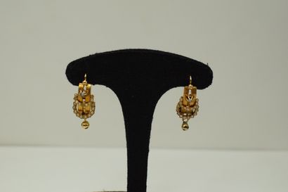 null Pair of 18K (750) yellow gold sleepers set with two rows of pearls and each...