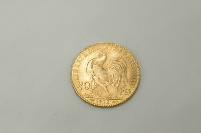 null Coin of 20 Francs in gold with the Rooster (1912).
Weight : 6.45g.