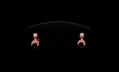null Pair of 925° pink vermeil sleepers decorated with round rubies probably treated...