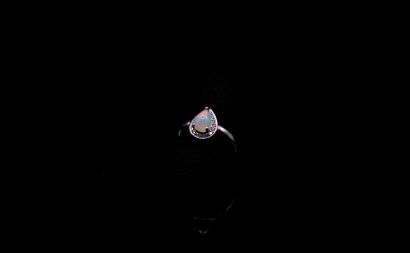 null Silver ring 925° centered of a white opal cabochon drop irregular in a surround...